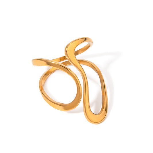Gold spiral ring on a white background