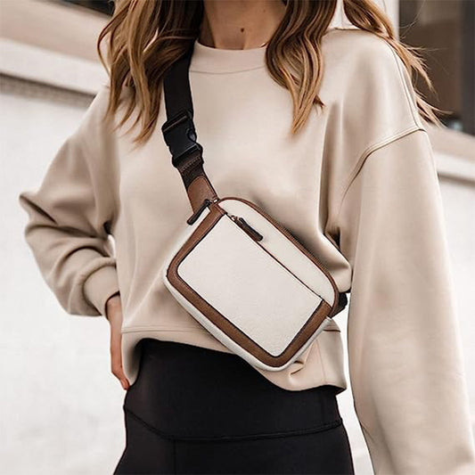 Arvella faux leather chest sling bag in two-tone design with adjustable strap – perfect for casual everyday wear.